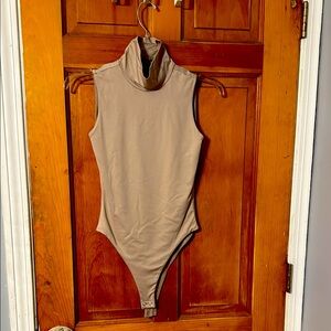 Kids Tan One Piece Bodysuit